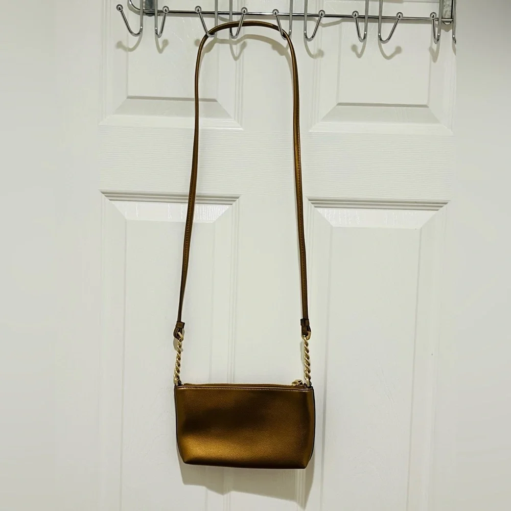 Calvin Klein Crossbody Bag in a bronze color featuring gold-toned hardware - Picture 3 of 5